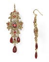 An ornate cascade of richly hued stones dangle from a French wire on this pair of Carolee earrings, lending after-hours opulence.