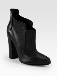 A rounded heel heightens this must-have leather ankle boot with detailed seaming and a classic point toe. Self-covered heel, 5 (125mm)Leather upperPoint toePull-on styleLeather lining and solePadded insoleImported