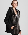 The essential Vince shearling coat satiates your desire for the sumptuous--lending luxury to your every look and style to your every day. Gorgeous in charcoal, this hooded layer is your day-to-night, workday-to-weekend coverup, so invest in the best and enjoy the season of decadence.