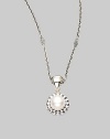 From the Luna Collection. A round pearl pendant with fluted border is suspended on an adjustable chain link.Pearl Sterling silver Length, about 16 - 18 Pendant width, about ½ Pendant length, about 1 Lobster clasp closure Imported 