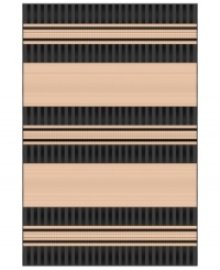 Stripecast: with wide, colorblocked bands and rich texture, Liorra Manne's Tropez Stripe rug has the ability to pull a room together in chic, relaxed style. UV-stabilized, mold and mildew-resistant, the versatile rug in black and oatmeal hues is equally pretty indoors or out.