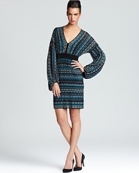 With a subtle retro look, Laundry by Shelli Segal's cozy knit sweater dress shows off chic comfort.