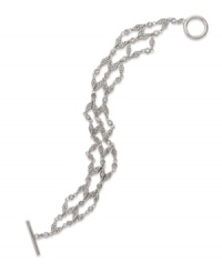 With a diamond deco design, this glitzy bracelet form Lauren Ralph Lauren adds a luminous touch with pave accents. Crafted in rhodium-plated brass. Approximate length: 7-1/2 inches.