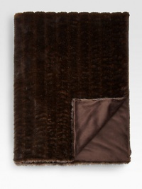 Decadently soft faux fur, designed and created in the USA of the most natural, authentic-looking fabrics. The rigorously inspected collectible is individually handcrafted and lined in velvet. 60 X 75AcrylicMachine washMade in USA