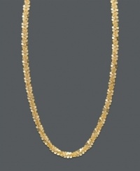 Decadent in gold. A simple chain is the perfect way to accessorize. Faceted chain is set in 14k gold. Approximate length: 18 inches.