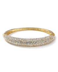 All-around crystals embed a studded, polished bangle from Lauren Ralph Lauren.