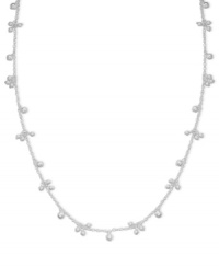 Perfect with a white blouse, even better doubled up with a little black dress. Long necklace by Lauren Ralph Lauren features clusters of silvertone beads. Crafted in mixed metal. Approximate length: 36 inches.