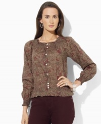 A delicate print accents Lauren Ralph Lauren's petite peasant top crafted from soft cotton with smocked accents for a romantic look.