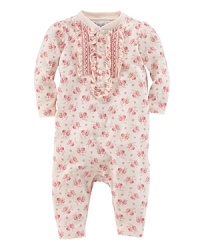 Finished with pretty ruffled accents, an adorable coverall is crafted in ultra-soft floral cotton jersey.