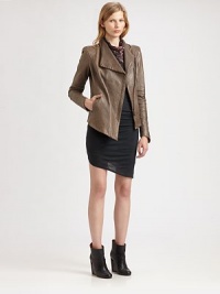 Embrace the urban-cool trend with this supple leather jacket, renewed by an oversized collar and asymmetrical hem. Oversized asymmetrical collarLong sleevesFront snap closures; zipperSlash pocketsAsymmetrical hemAbout 23 from shoulder to hem at longest pointLeatherDry clean with leather specialistImported of Italian fabricModel shown is 5'10 (177cm) wearing US size Small.