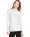 Style&co.'s turtleneck features a contoured fit, flattering ribbed detail and a shimmery metallic finish.