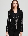 Dripping with decadent sequins, this Calvin Klein jacket steals the spotlight with unapologetic glamour appeal.