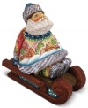 A beautiful work of art on its own, this ornament from DeBrekht features an exquisitely carved Santa Claus sitting on a sleigh with a quaint, snowy village landscape hand painted upon his sweater.