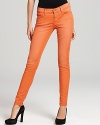 Subtle fading creates a cool sun-bleached effect on these vibrantly hued 7 For All Mankind skinny jeans.