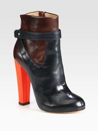 An eye-catching rubber heel freshens this colorblock ankle boot of supple Italian leather. Rubber heel, 5 (125mm)Hidden platform, ½ (15mm)Compares to a 4½ heel (115mm)Leather upperSide zipLeather lining and solePadded insoleMade in Italy