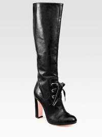 Redefine strong femininity wearing this impeccably crafted leather boot, with sumptuous velvet laces and a tall heel. Self-covered heel, 4 (100mm)Shaft, 15½Leg circumference, 13½Leather upper with velvet lacesSide zipLeather lining and solePadded insoleMade in ItalyOUR FIT MODEL RECOMMENDS ordering true size. 