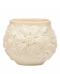 Teeming with fresh blooms in graceful ivory porcelain, Floral Fields votive candle holders from Lenox have a serene, understated elegance and simple silhouette.