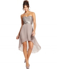 A sequin bodice and dreamy, pleated skirt unite in perfect harmony, creating an elegant dress for a night to remember! From As U Wish.