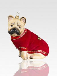 Donned in a cozy red velvet sweater, this darling doggie is delightfully detailed in mouth-blown, hand-painted glass.Glass3.5H X 3W X 2DImported