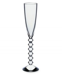 Baccarat redefines bold with the statuesque Vega flute. Premium crystal balancing a clear bowl and chunky, beaded stem exudes chic luxury in any setting.