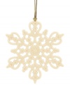 Turn a white Christmas fantasy into reality with this classic snowflake ornament from Lenox. Intricate pierced detail and an elegant ivory glaze help you and your family create your very own winter wonderland.