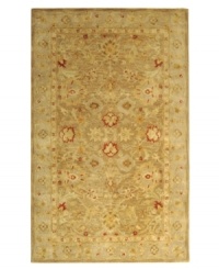 Lavish your space in timeless tradition, set in soft, earthy shades on this exquisite area rug from Safavieh. Tufted in India from pure wool, this rug emerges from the annals of antiquity to bring spectacular style and time-honored quality to your home. (Clearance)