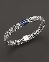 Bead-textured bracelet from Lagos in sterling silver, accented with blue sapphire.