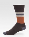 Bold stripes are knitted in a luxurious blend of stretch cotton.Mid-calf height72% cotton/26% nylon/2% spandexMachine washImported