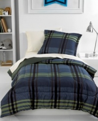 Featuring variegated stripes and zigzags, this Lisbon Navy comforter set renews your space with a fresh take on classic designs all in a dramatic blue, green and black palette.