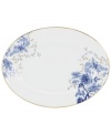 Like a traditional Toile pattern, the elegant blooms that grace the Lenox Garden Grove oval platter render any setting timeless. Gold leaf accents and luxurious banding contrast classic bone china with of-the-moment style.