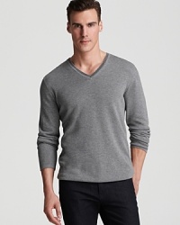 A reliable everyday sweater from Michael Kors in comfortable cotton, featuring stripes at the neck for athletic appeal.