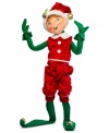 He'll be there with bells on. Sporting long elfin shoes and a velvety red jumpsuit, this irresistible figurine brings the joy of Christmas wherever he goes. With the crafted charm and soft, flexible features of Annalee dolls.