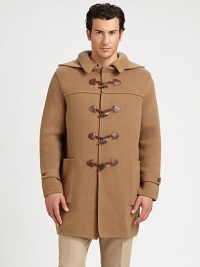 Impeccably crafted in Italy from luxurious wool, this cold weather essential exudes a modern sensibility with a point collar and attached hood, finished with leather-accented toggle closure for a heritage-inspired feel.Toggle closureAttached hoodWaist patch pocketsAbout 35 from shoulder to hemWoolDry cleanMade in Italy