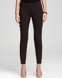 Try out this season's equestrian trend in sleek Eileen Fisher riding pants--extra chic slipped into leather boots.