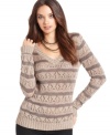 A hint of metallic adds shine to this GUESS striped & textured sweater -- perfect for everyday style!