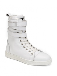 This high top lace-up design is all about the details, adorned with a trio of ankle straps and an exposed zipper for added edge.Italian leather upper Lace up and zip closure Ankle straps with grip-tape closure Leather lining Padded insole Rubber sole Imported