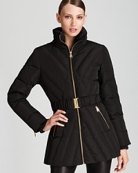 Exposed zips lend luxe shine to this chevron-quilted puffer coat from Via Spiga--a chic city essential.