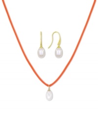 Casual chic. This pendant and earrings set from Majorica pops with organic man-made pearls (9 mm). The orange cord necklace adds a touch of whimsy. Crafted in gold tone mixed metal. Approximate length: 16 to 18 inches. Approximate drop: 1/2 inch.