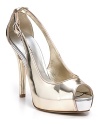 Shiny gold mirror leather makes a statement on the ultra-glam Hondola platform pumps from GUESS.