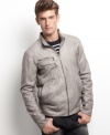 With a rugged worn-in look and a sleek leather-like style, this Guess Jeans jacket is undeniably cool.