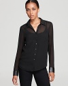 Sheer perfection for fall, this GUESS top flaunts luxe textured cuffs for an elegant element of surprise.