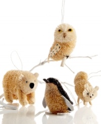 In from the cold. Crafted of natural buri, these snow-white creatures bring a bit of arctic cool to your Christmas tree. Featuring polar bear, snow owl, arctic fox and penguin ornaments, all from Martha Stewart Collection.