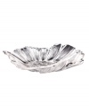 A delicately ruffled flower in pure glass, this figural Leporis platter from Gibson suffuses your table with a touch of spring. Use for serving the meal or as a simple centerpiece.