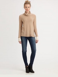 Luxe knit cashmere in a lightweight pullover styled with a soft, shapely cowlneck.CowlneckRaglan sleevesPullover styleRibbed trimCashmereHand washImportedModel shown is 5'10 (177cm) wearing US size Small.