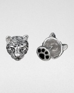 Wild about style, these antiqued sterling silver cuff links are crafted in a tiger's head and paw design.Sterling silverPaw-shaped backAbout .67 diam.Made in USA