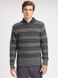 A new classic, a merino-wool knit sweater with a brilliant pattern.CrewneckPull-on styleMerino woolDry cleanImported