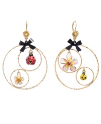 Get down with your inner flower child in Betsey Johnson's flirty gypsy hoop earrings. Each delicate hoop features a colorful ladybug and a petite flower charm. Crafted in gold-plated mixed metal with yellow, pink, white, and black enamel accents and tiny black ribbons. Approximate drop: 3 inches.