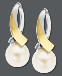 Sophistication at its finest. These pretty looped drop earrings combine a 14k gold and sterling silver setting with a cultured freshwater pearl (8 mm) and diamond accent. Approximate drop: 3/4 inch.