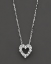 A beautiful diamond heart pendant in 14 Kt. white gold, with rope chain.