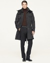 Ample utility pockets, handsome epaulets and a detachable hood lend a sleek Black Label coat deconstructed military edge.